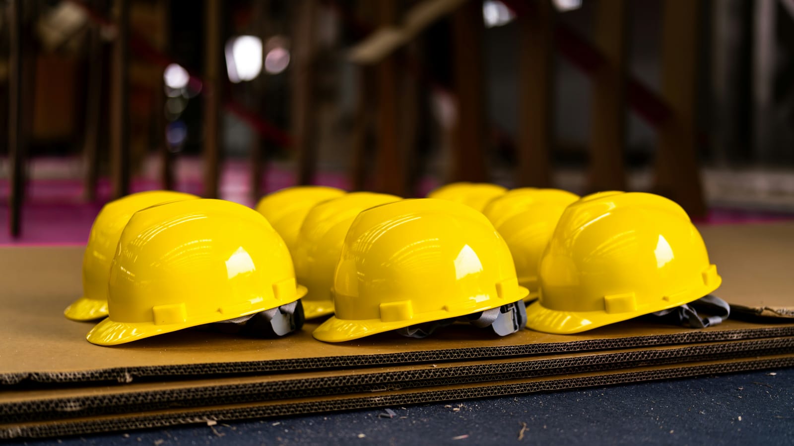 Rows of new hard hats lined up ready for the next crew